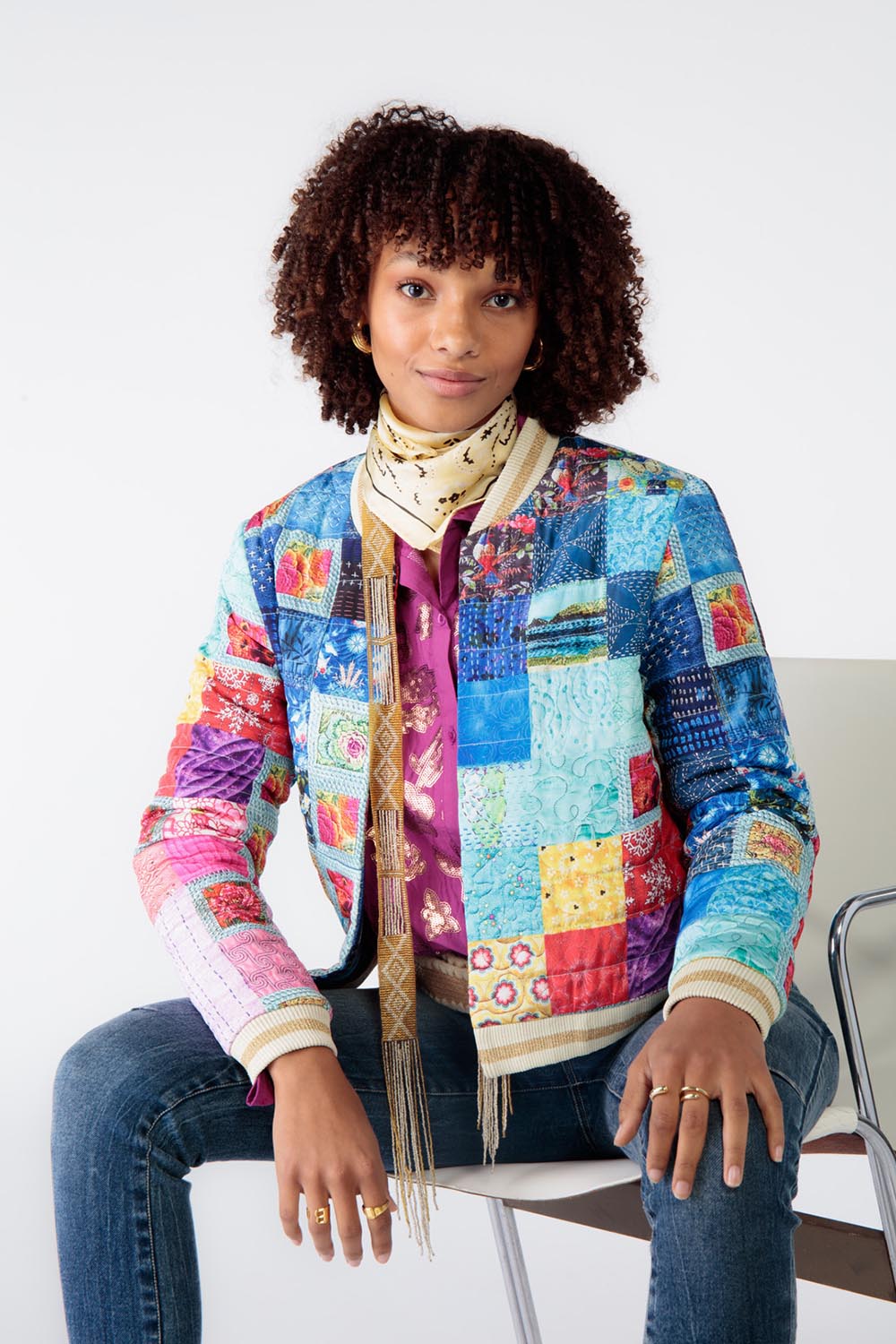 A model wearing the Oklahoma Quilted Jacket in colour Multi (Blue), from the front, cropped image