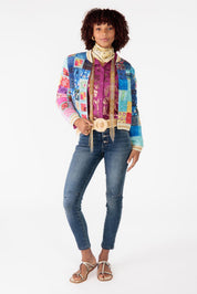 A model wearing the Oklahoma Quilted Jacket in colour Multi (Blue), from the front, showing the whole outfit