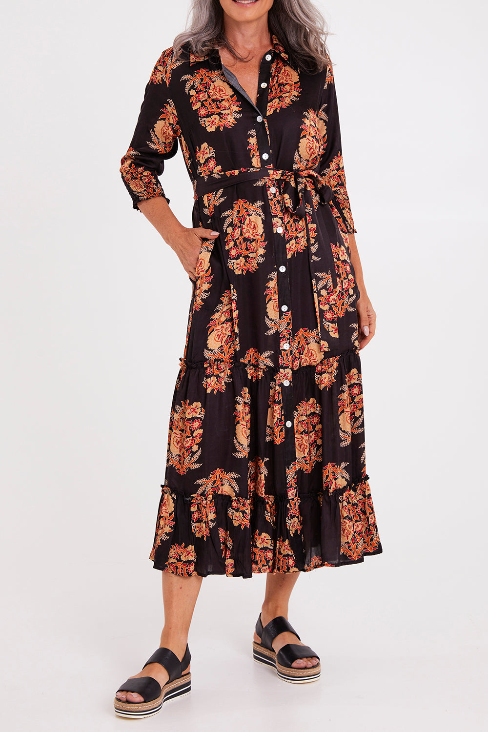 Model Luisa wearing size S of the Paisley Dress in colour Black (Black), from the front, cropped image