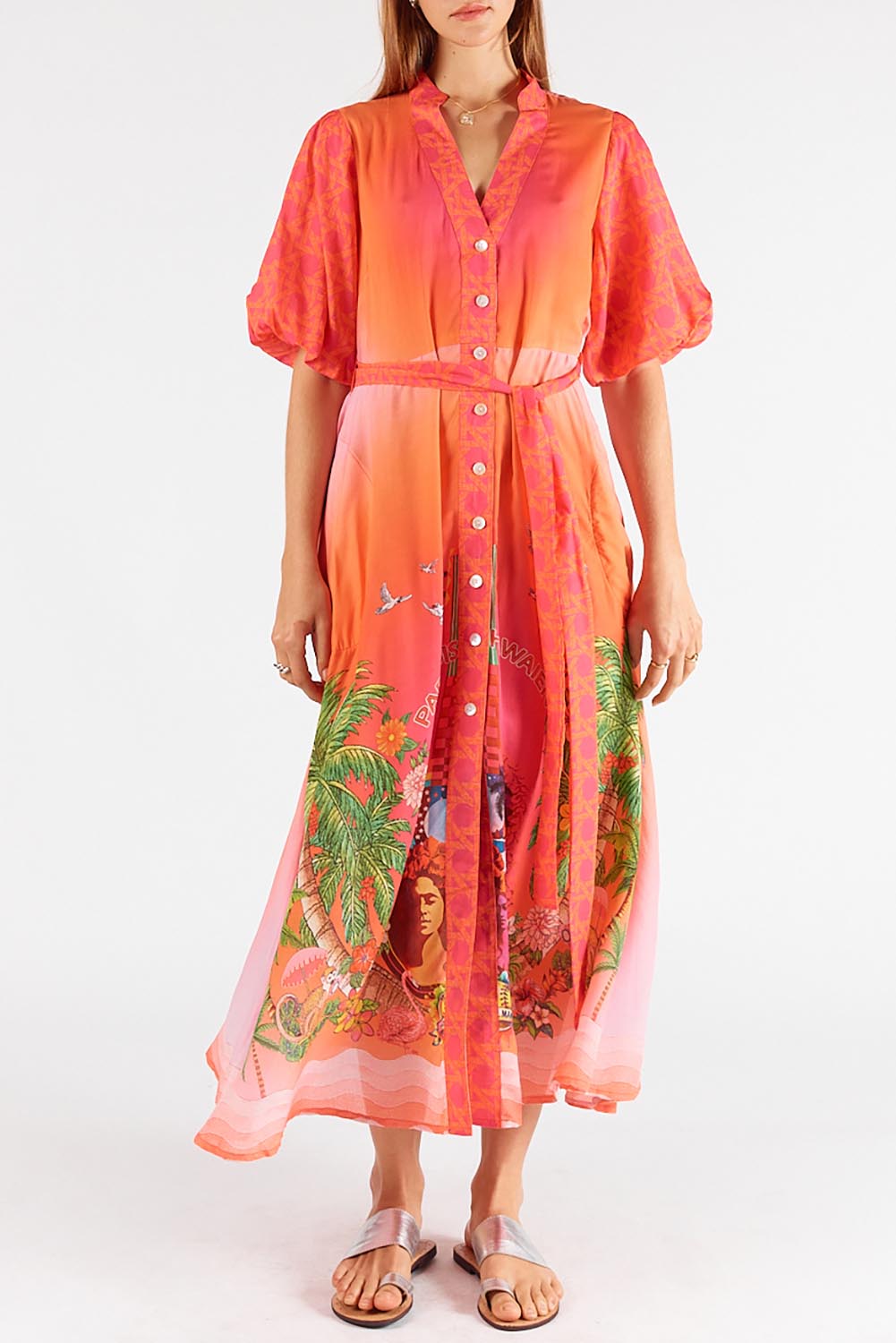 A model wearing the Paradis Maxi Dress in colour Pink (Pink), from the front, cropped image