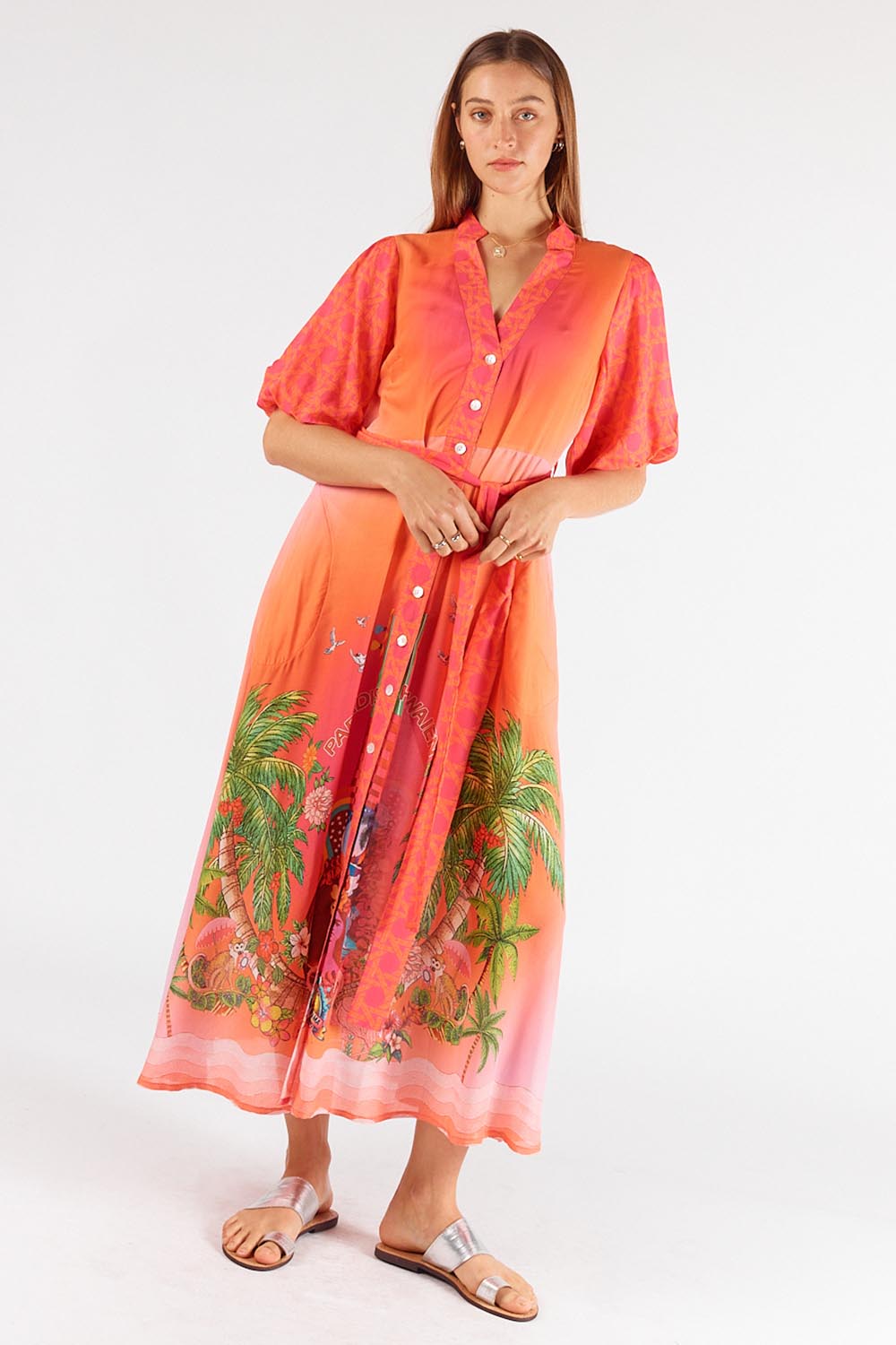 A model wearing the Paradis Maxi Dress in colour Pink (Pink), from the front, showing the whole outfit