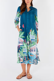 A model wearing the Paraty Cotton Kaftan Dress in colour Multi (Blue), from the front, cropped image