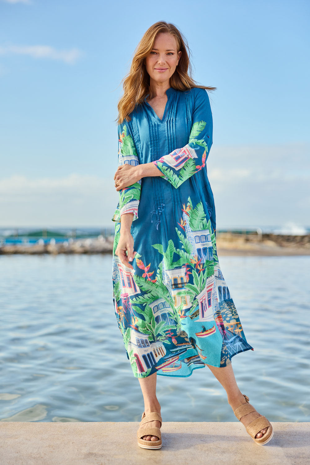 Model Katie wearing size S of the Paraty Cotton Kaftan Dress in colour Multi (Blue), from the front, showing the whole outfit