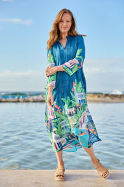 Model Katie wearing size S of the Paraty Cotton Kaftan Dress in colour Multi (Blue), from the front, showing the whole outfit
