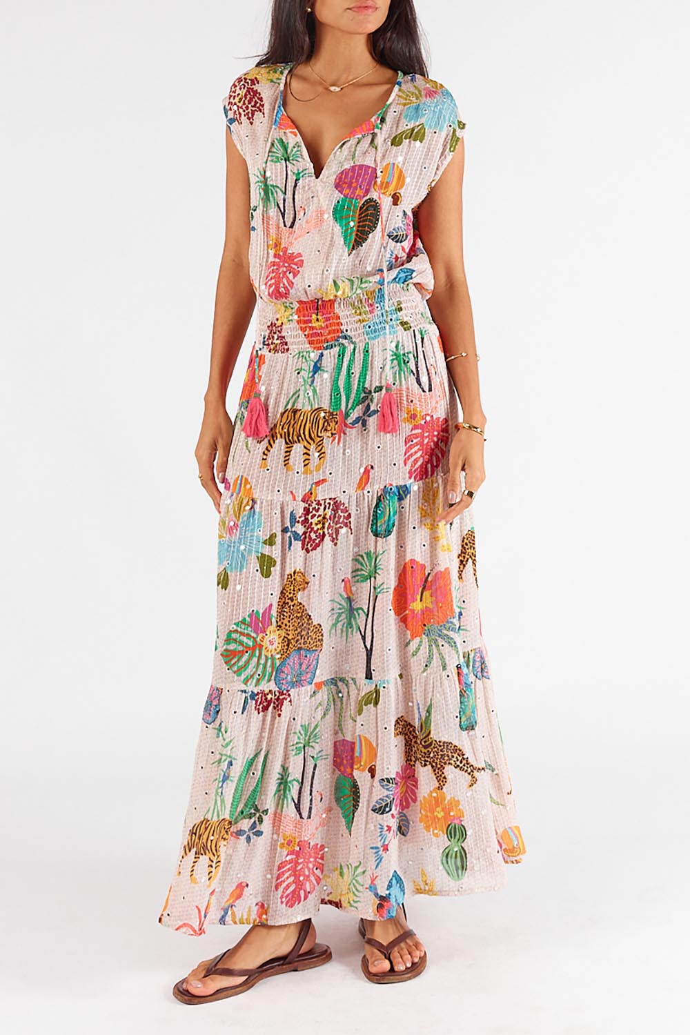 A model wearing the Pretoria Maxi Dress in colour Cream, from the front, cropped image