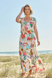 Model Riina wearing size S of the Pretoria Maxi Dress in colour Cream, from the front, showing the whole outfit