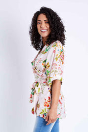 Model Pamela wearing size S of the Priscilla Top in colour Pink (Pink), from the front, cropped image