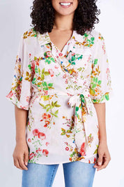 Model Pamela wearing size S of the Priscilla Top in colour Pink (Pink), from the front, cropped image