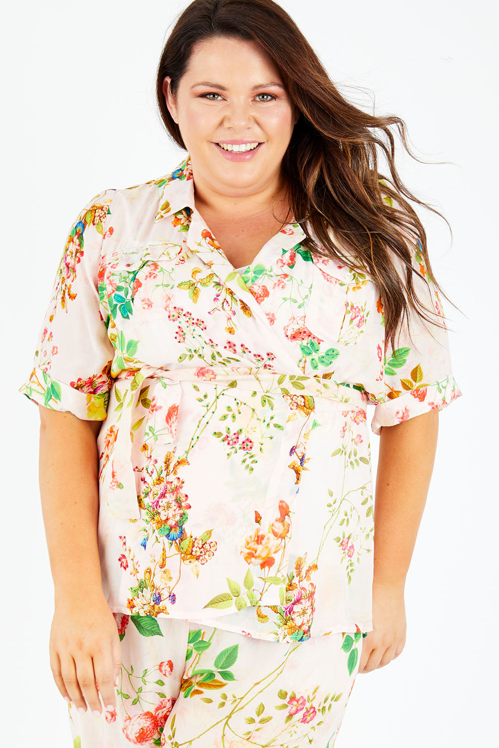 Model Stacey wearing size XL of the Priscilla Top in colour Pink (Pink), from the front, cropped image
