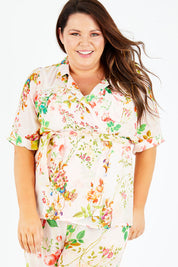 Model Stacey wearing size XL of the Priscilla Top in colour Pink (Pink), from the front, cropped image