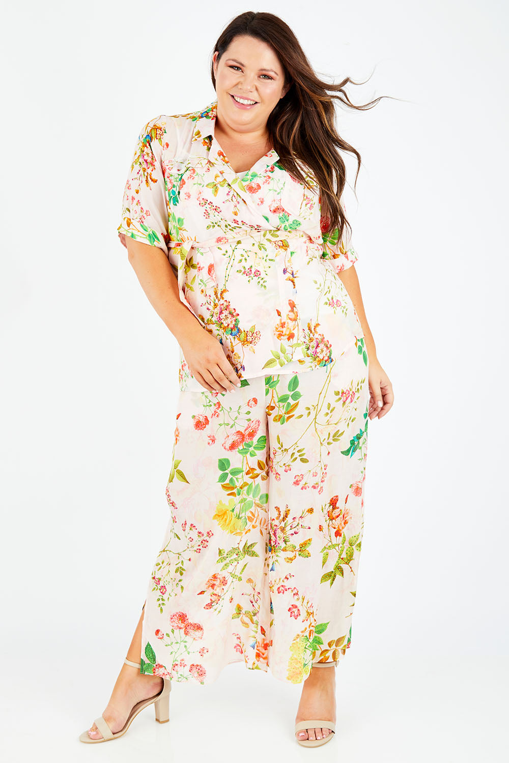 Model Stacey wearing size XL of the Priscilla Top in colour Pink (Pink), from the front, showing the whole outfit