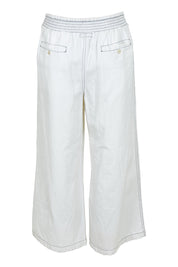 Product shot of the Pula Pant in colour White (White), from the back