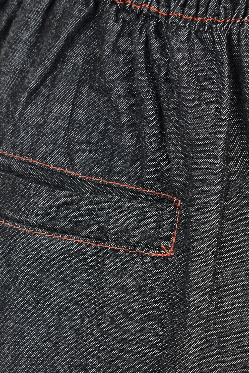 Product shot of the Pula Denim Pant in colour Black (Black), detail
