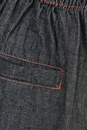 Product shot of the Pula Denim Pant in colour Black (Black), detail