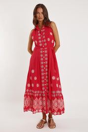 A model wearing the Ravello Cotton Maxi Dress in colour Watermelon (Red), from the front, showing the whole outfit
