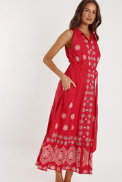 A model wearing the Ravello Cotton Maxi Dress in colour Watermelon (Red), from the front, showing the whole outfit