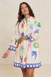 Model Tahnee wearing size S of the Rock Lobster Cotton Dress in colour Print (White), from the front, showing the whole outfit