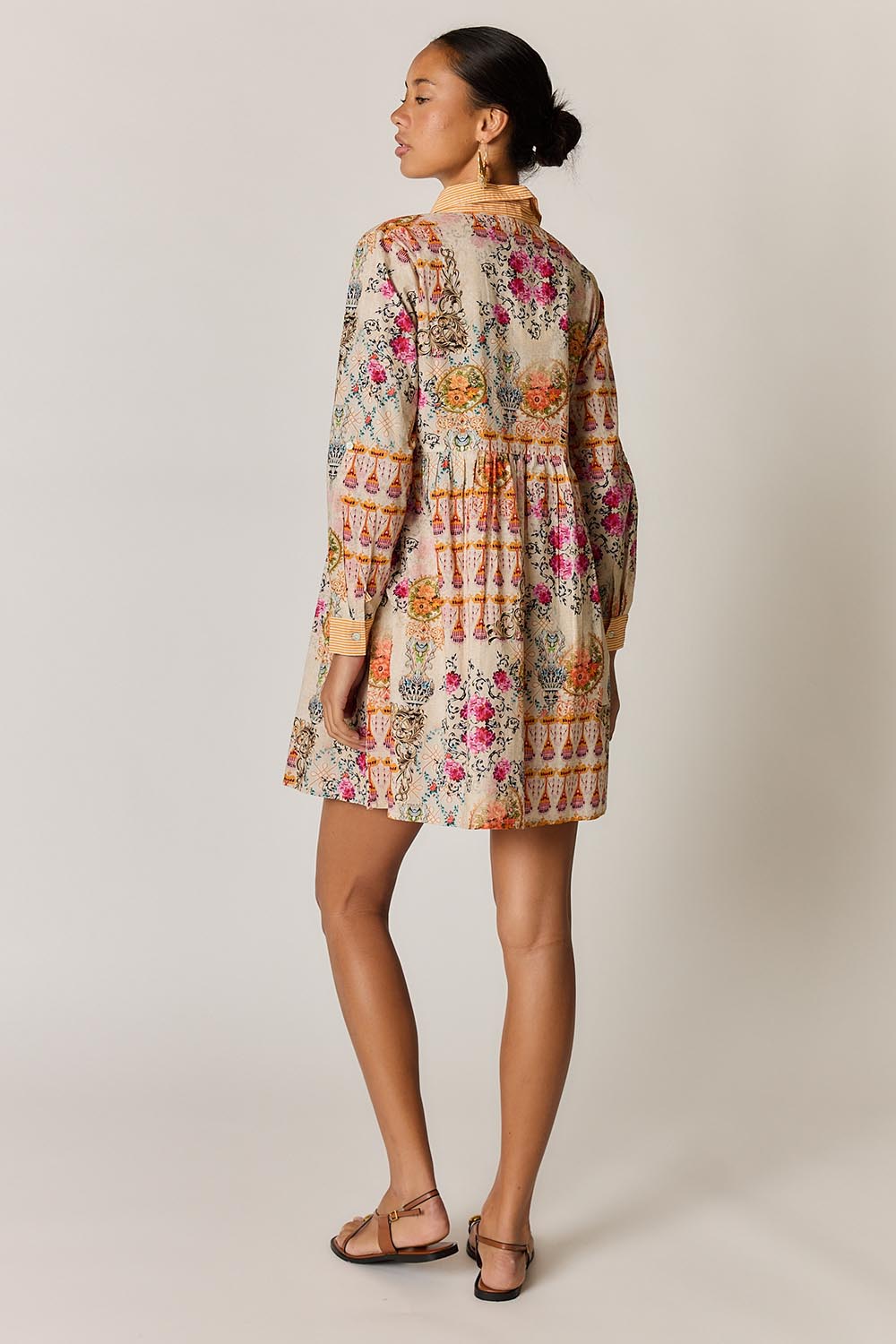 Model Genericm wearing size sample of the Rosetta Dress – Gold in colour Gold, from the front
