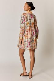 Model Genericm wearing size sample of the Rosetta Dress – Gold in colour Gold, from the front