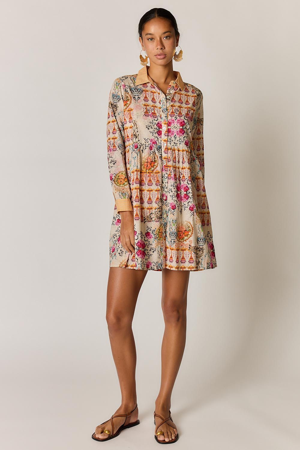 Model Genericm wearing size sample of the Rosetta Dress – Gold in colour Gold, from the front