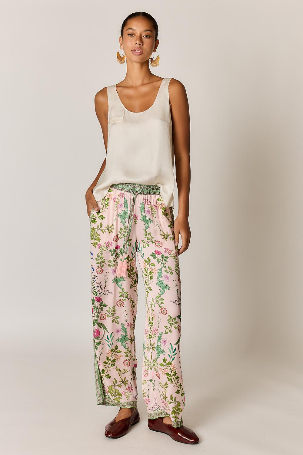 Model Genericm wearing size sample of the Tatiana Pant – Pink in colour Pink, from the front