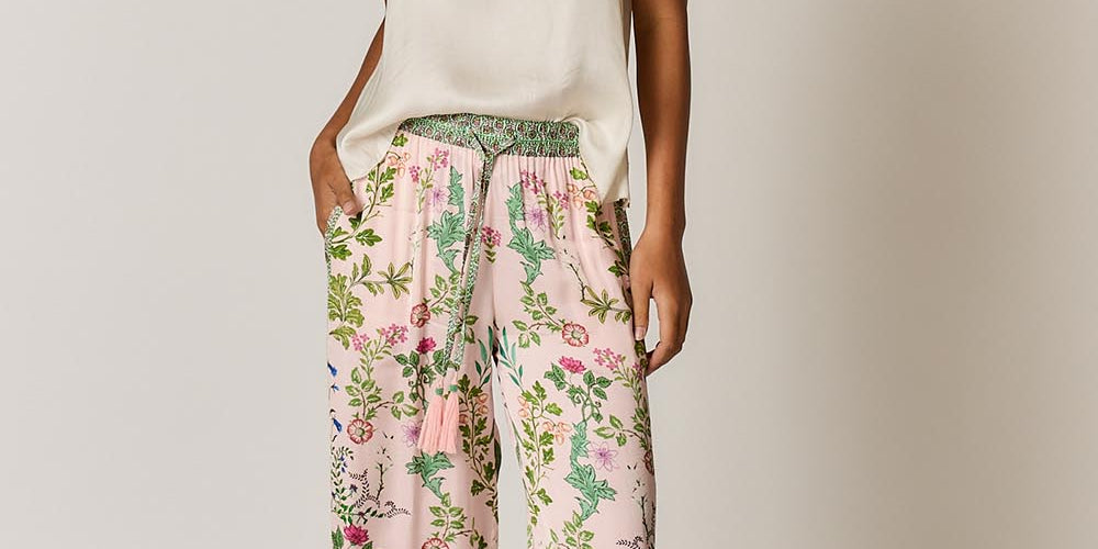Model Genericm wearing size sample of the Tatiana Pant – Pink in colour Pink, from the front