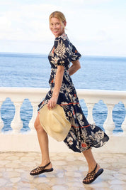 Model Genericm wearing size sample of the Tucan Cotton Maxi Dress – Black in colour Black, from the front
