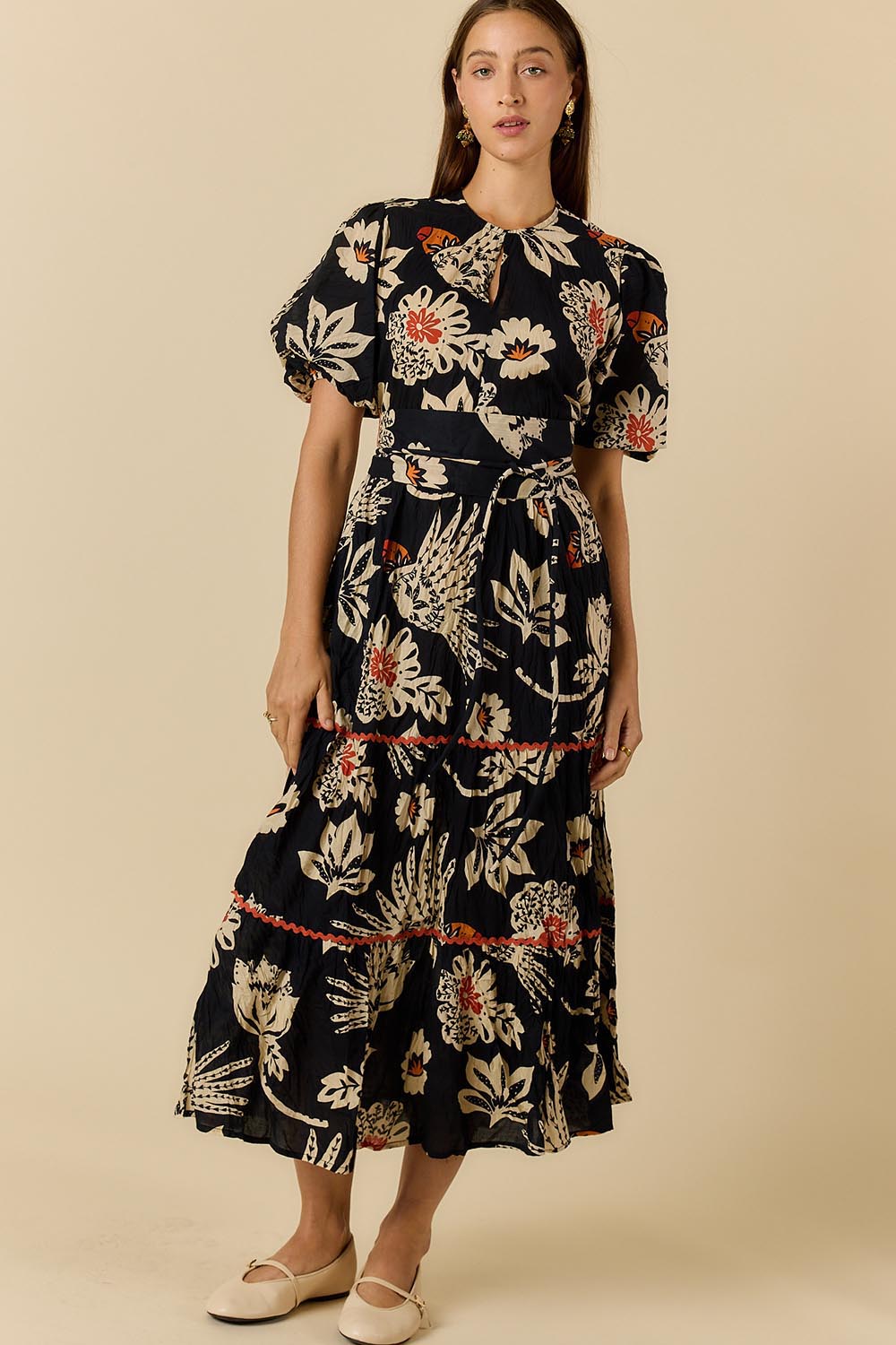 Model Genericm wearing size sample of the Tucan Maxi Dress – Black in colour Black, from the front