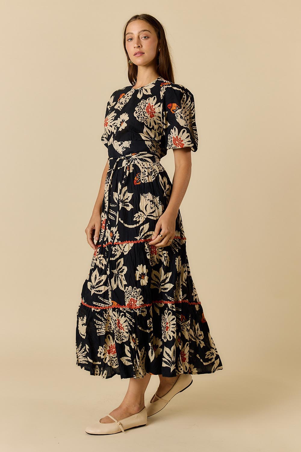 Model Genericm wearing size sample of the Tucan Maxi Dress – Black in colour Black, from the front