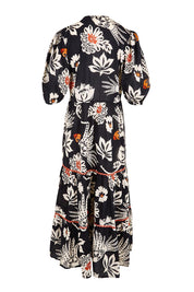 Product shot of the Tucan Cotton Maxi Dress – Black in colour Black, from the back