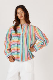 A model wearing the Vishnik Cotton Shirt in colour Stripe, from the front, cropped image
