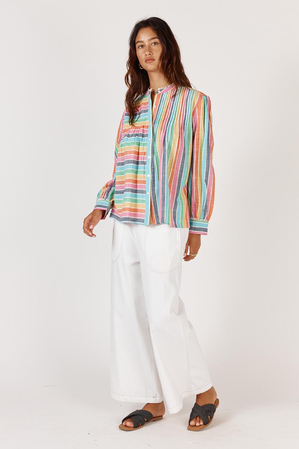 A model wearing the Vishnik Cotton Shirt in colour Stripe, from the front, showing the whole outfit
