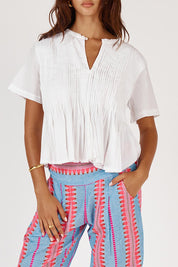 A model wearing the Vivian Cotton Top in colour White (White), from the front, cropped image
