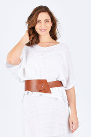 Model Lisa wearing size S of the Wenzel Kaftan in colour White (White), from the front, cropped image