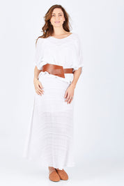 Model Lisa wearing size S of the Wenzel Kaftan in colour White (White), from the front, showing the whole outfit