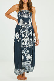 Model Madeline wearing size S of the Zari Sundress in colour Navy (Blue), from the front, cropped image