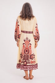 Model Luisa wearing size S of the Zeezee Dress in colour Cream, from the back