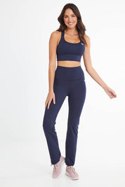 Model Madeline wearing size 10 of the Ab Tastic Peach Studio Jazz Bootleg in colour Crew (Blue), from the front, showing the whole outfit