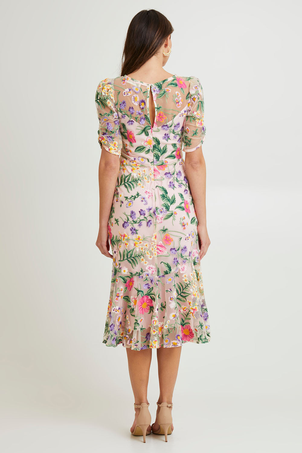 Model Madeline wearing size 10 of the Cardelina Embroidered Mesh Dress in colour Lavender (Pink), from the back