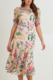 Model Madeline wearing size 10 of the Cardelina Embroidered Mesh Dress in colour Lavender (Pink), from the front, cropped image