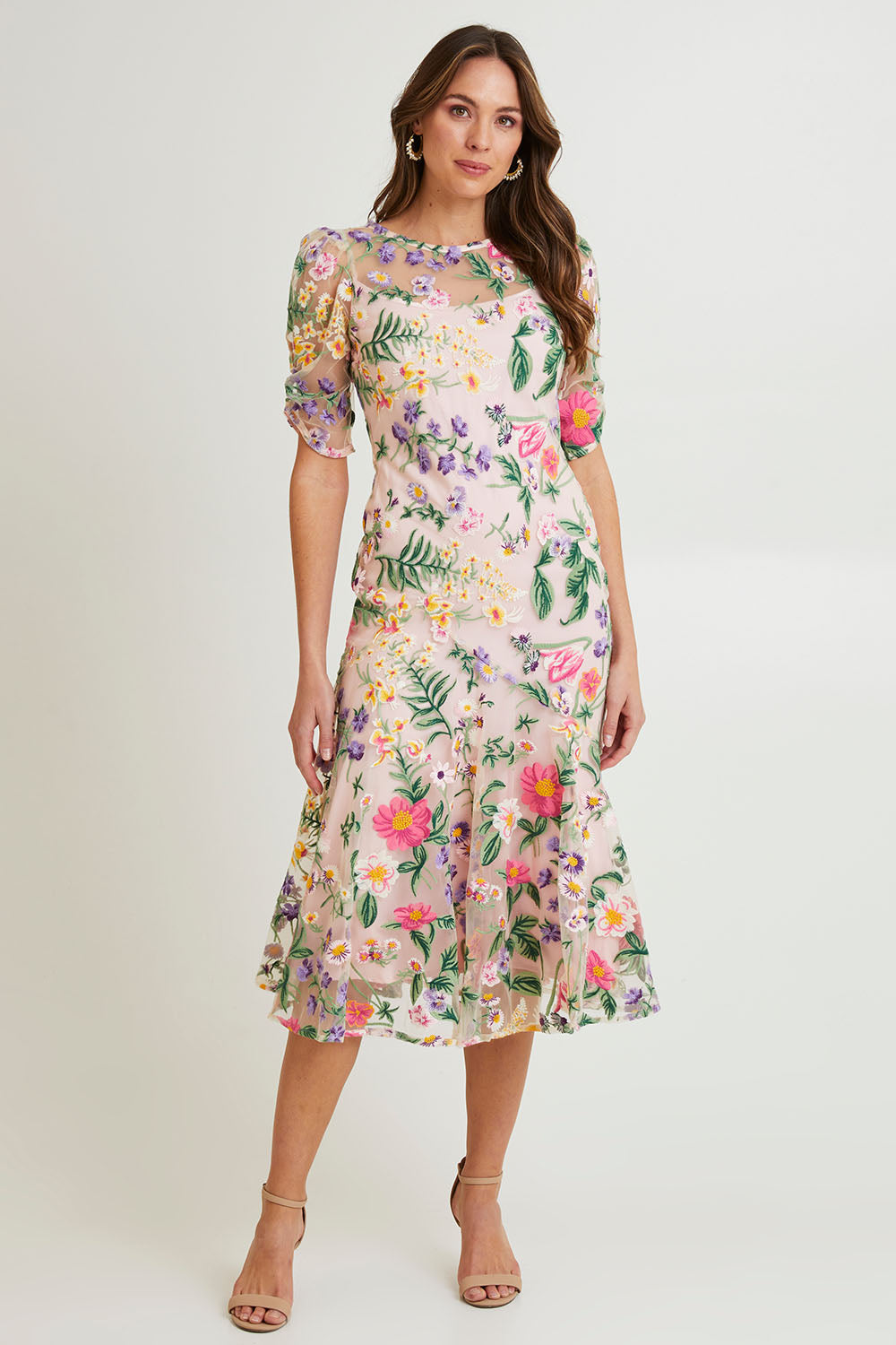 Model Madeline wearing size 10 of the Cardelina Embroidered Mesh Dress in colour Lavender (Pink), from the front, showing the whole outfit