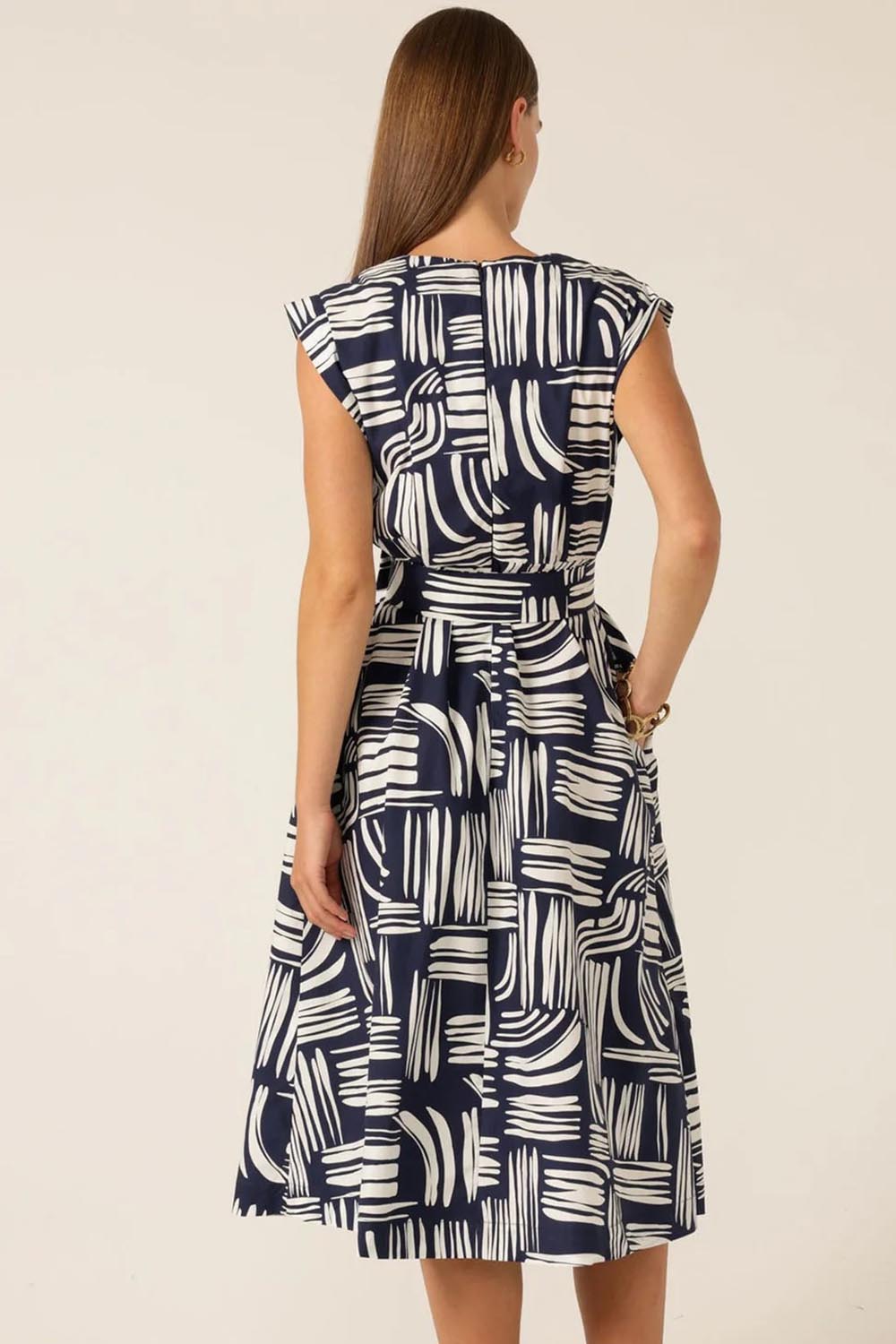 A model wearing the Clermont Cotton Fit And Flare Dress in colour Navy (Blue), from the back