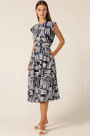 A model wearing the Clermont Cotton Fit And Flare Dress in colour Navy (Blue), from the front, showing the whole outfit