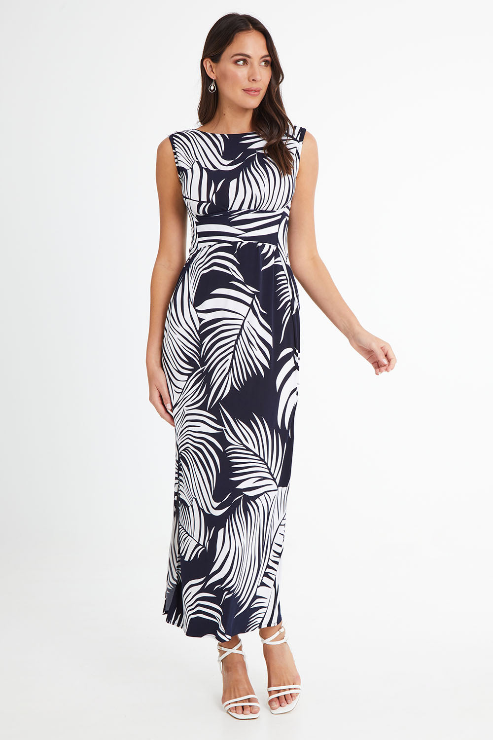 Model Madeline wearing size 10 of the Moonshadow Palm Maxi Dress in colour Navy (Blue), from the front, showing the whole outfit