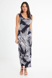Model Madeline wearing size 10 of the Moonshadow Palm Maxi Dress in colour Navy (Blue), from the front, showing the whole outfit