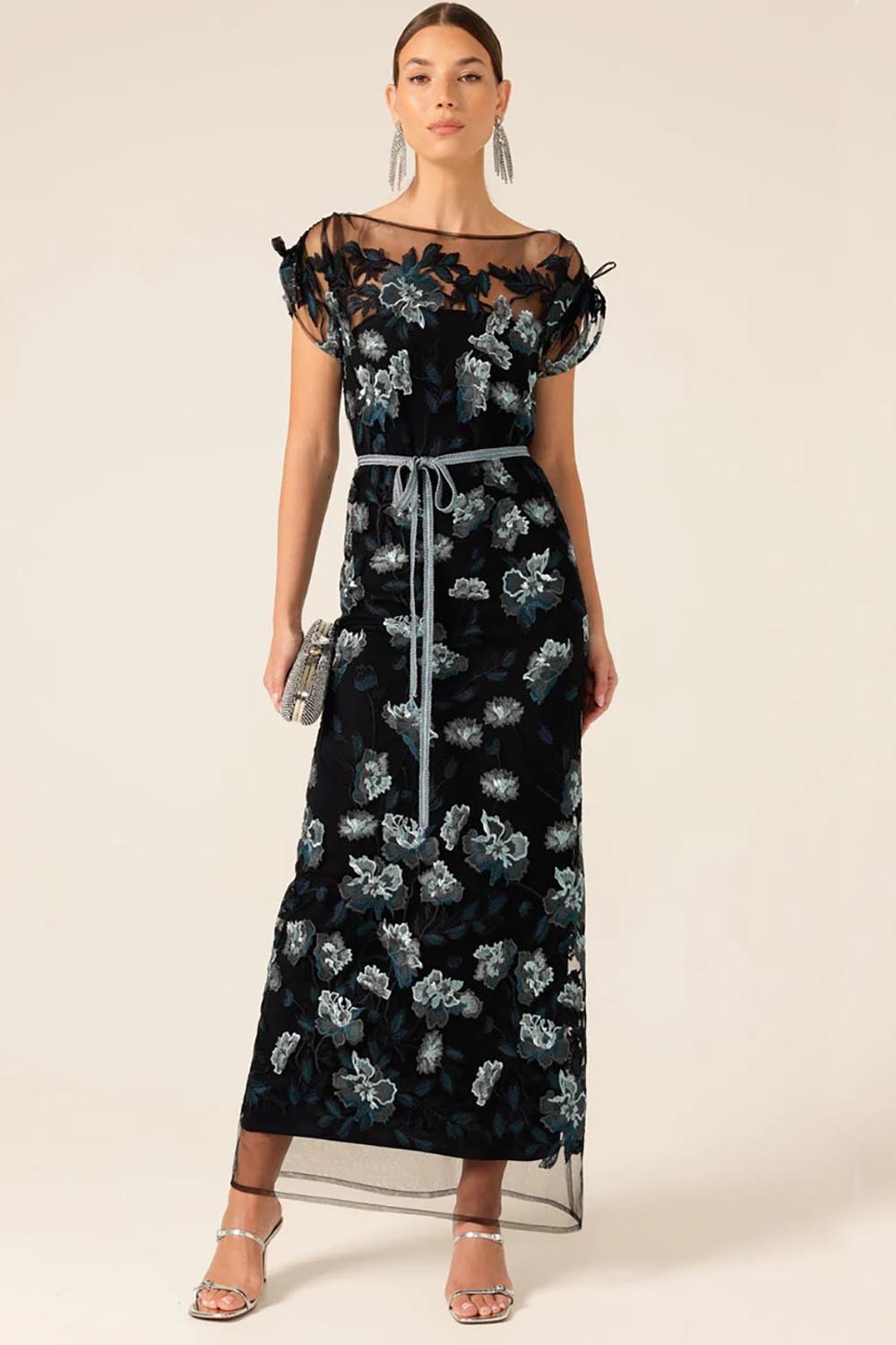 A model wearing the Love Potion Maxi Dress in colour Midnight (Blue), from the front, showing the whole outfit