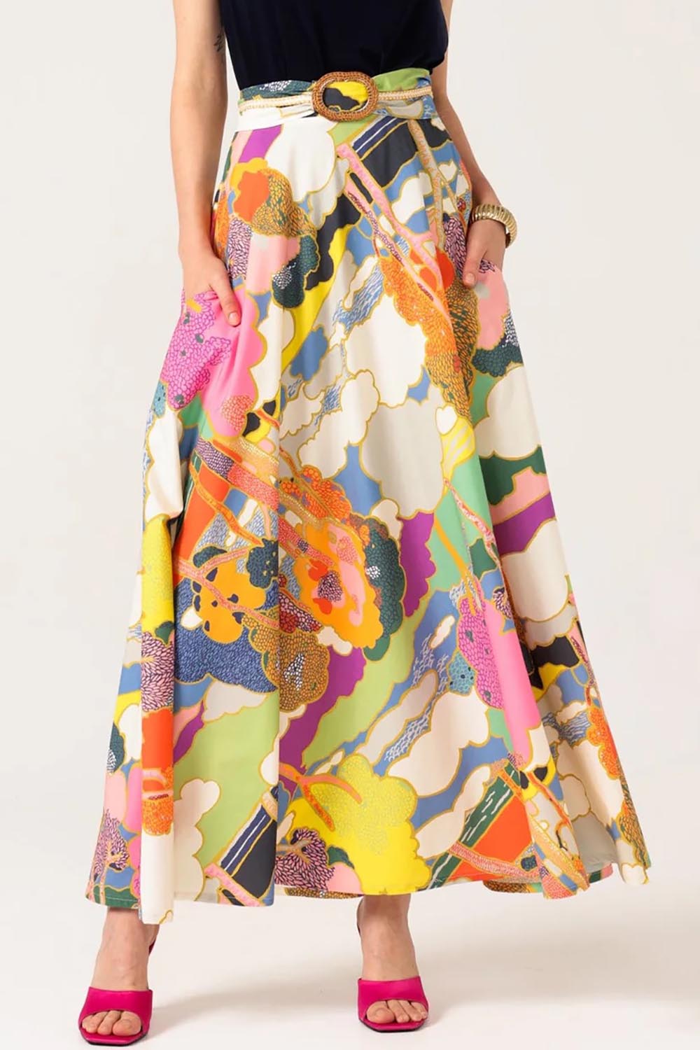 A model wearing the Florida Cotton Maxi Skirt in colour Cloud, from the front, cropped image