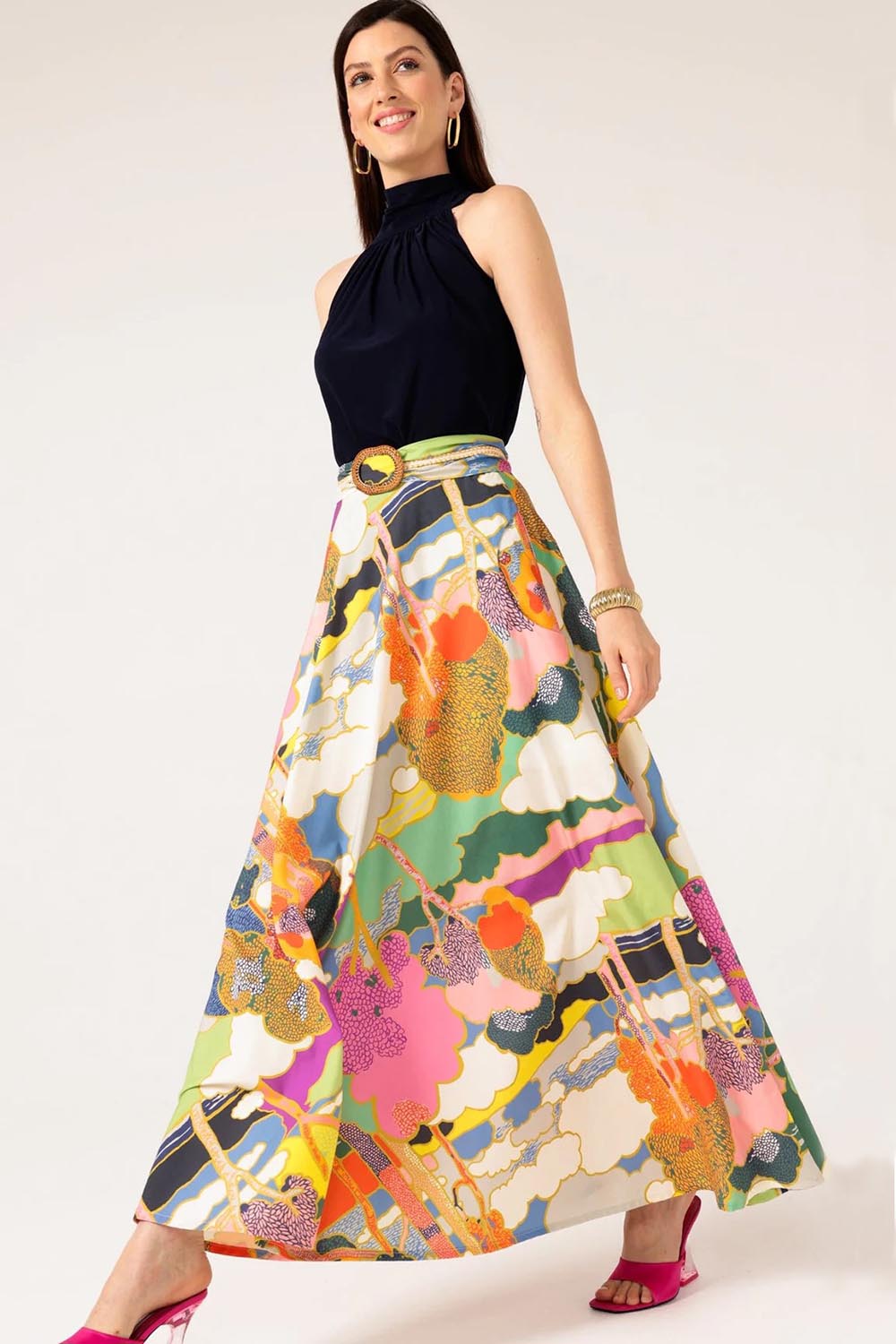 A model wearing the Florida Cotton Maxi Skirt in colour Cloud, from the front, showing the whole outfit