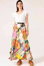 A model wearing the Florida Cotton Maxi Skirt in colour Cloud, from the front, showing the whole outfit