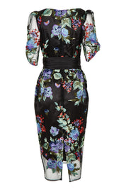 Product shot of the Mont Tombe Dress in colour Floral (Black), from the back
